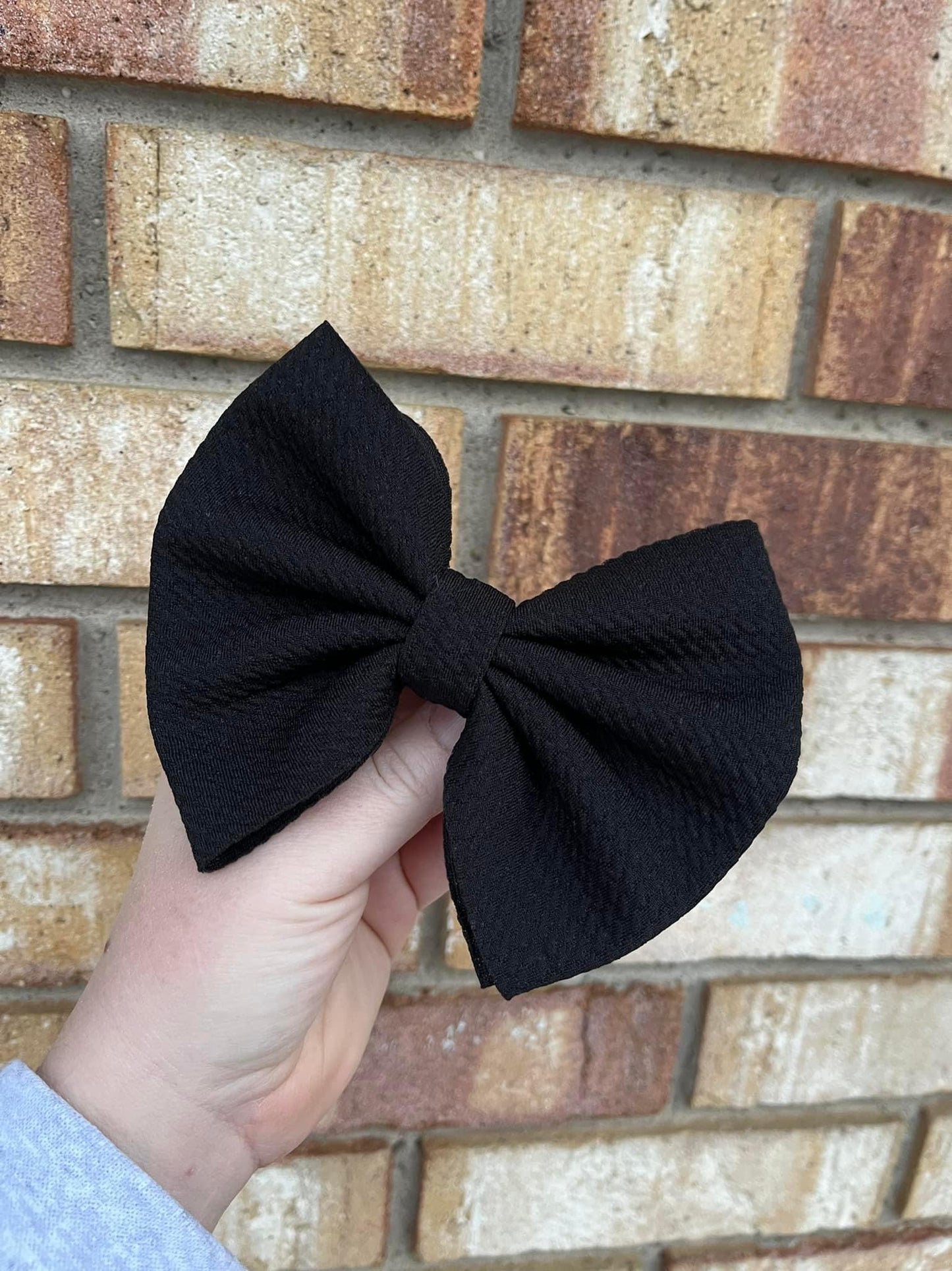 Black Clip In Bow
