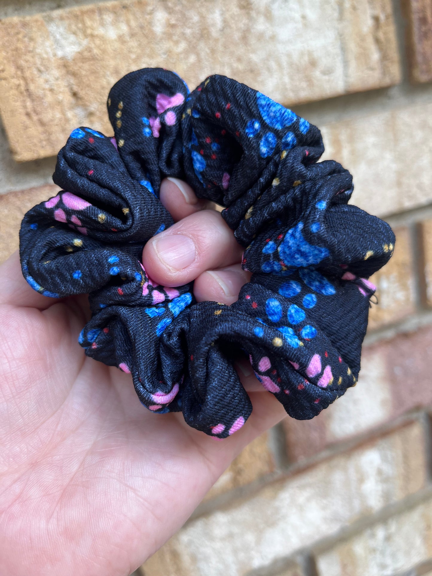 Blue and pink paw prints