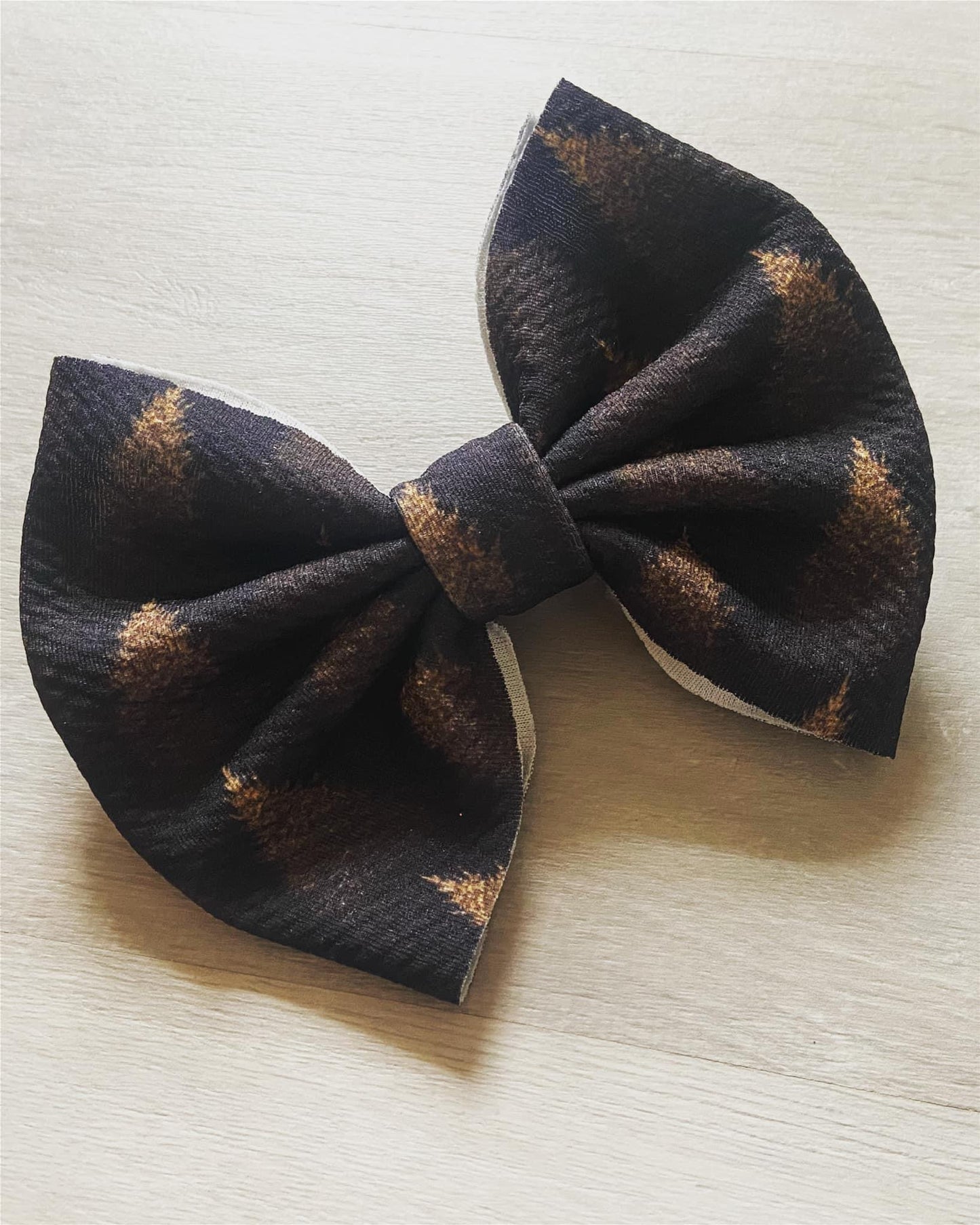 Black And Gold Trees Bow